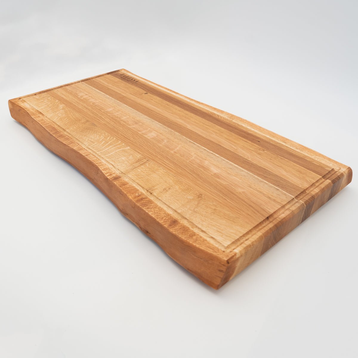 BABOSSA | Eichen Schneidebrett XL | Naturkante | Saftrille | 70x40x6 cm - BABOSSABABOSSA | Eichen Schneidebrett XL | Naturkante | Saftrille | 70x40x6 cmHolzbrettBABOSSABABOSSA